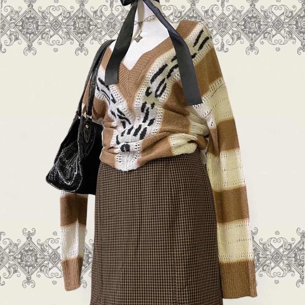 Vintage oversized tan white and black V neck animal print sweater